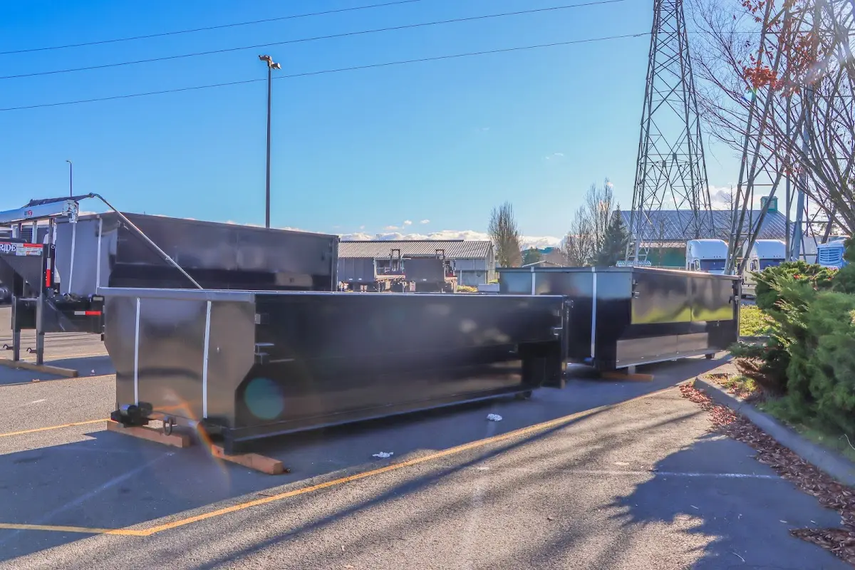 Roll-off dumpster ready for waste disposal at job site for Roofing Dumpster Rental in Covington